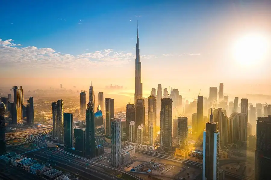 Aerial skyline of downtown Dubai filled with modern skyscrapers in the United Arab Emirates rising above the main city highway aerial view at sunrise. Image used for illustrative purpose. Getty Images , Getty Images