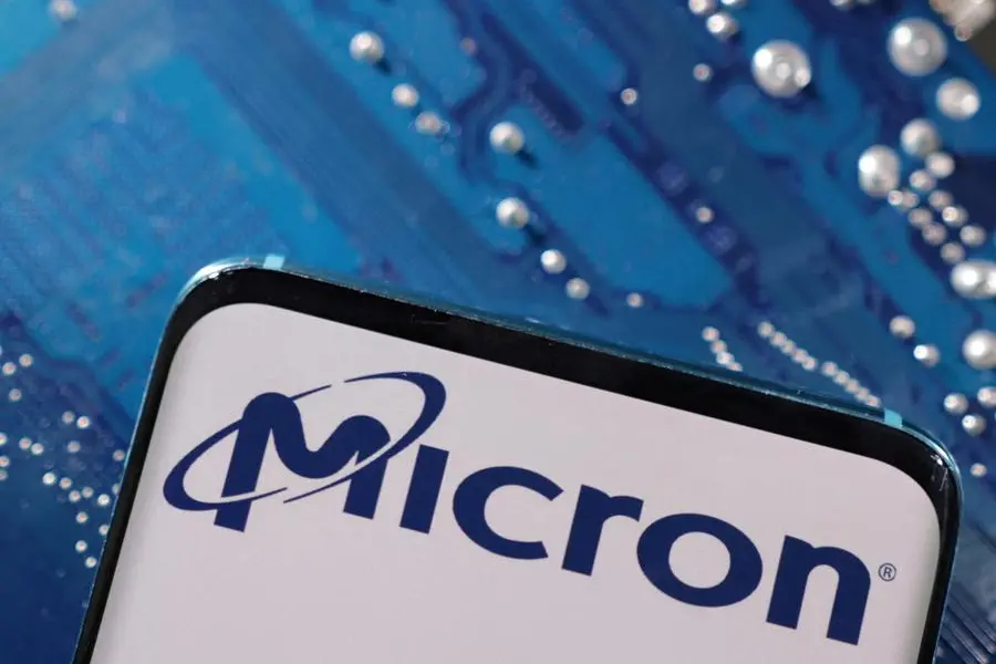 FILE PHOTO: A smartphone with a displayed Micron logo is placed on a computer motherboard in this illustration taken March 6, 2023. REUTERS/Dado Ruvic/Illustration. , Reuters