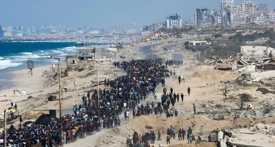 Gazans return to wrecked homes as Israeli forces pull back under ceasefire
