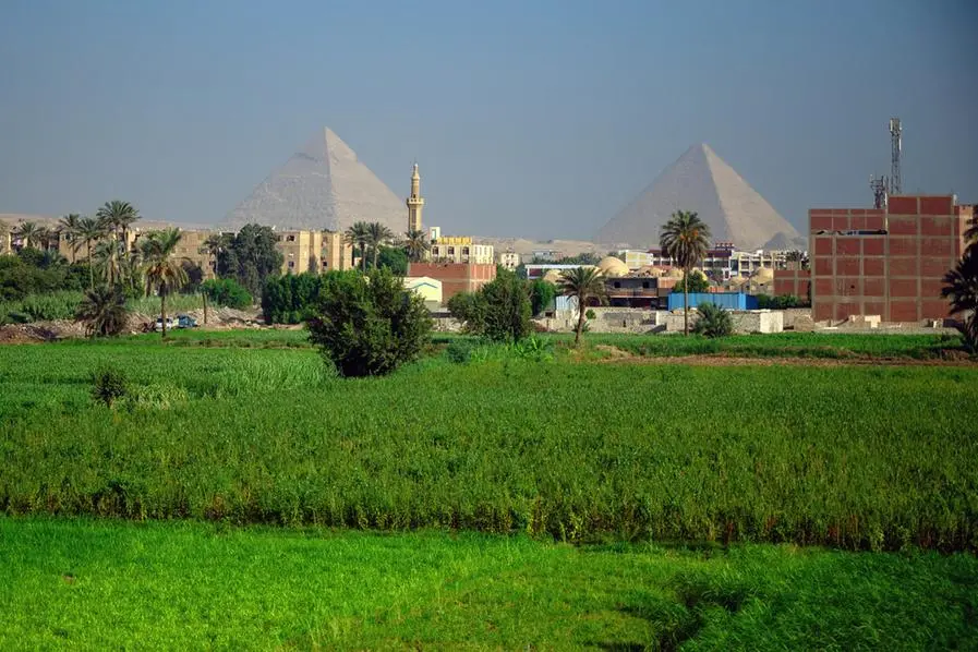 View of Giza cityscape with The Great Pyramid of Khufu and The Great Pyramid of Khafre at the background - Giza - Egypt - North Africa . Image used for illustrative purpose. Getty Images , Getty Images