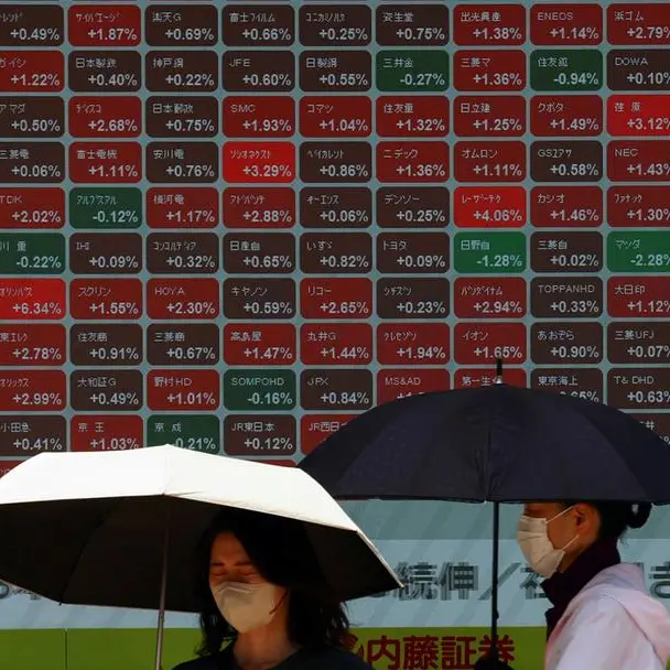 Shares steady, yen slides after US issues tariff letters