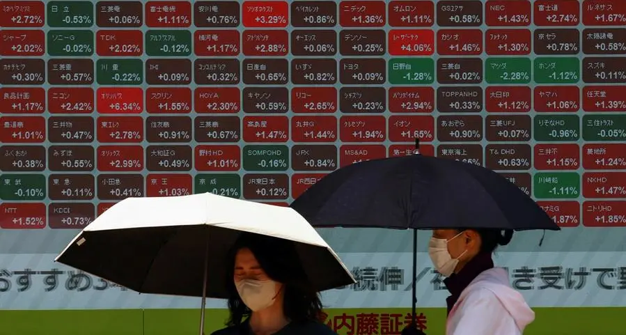Shares steady, yen slides after US issues tariff letters