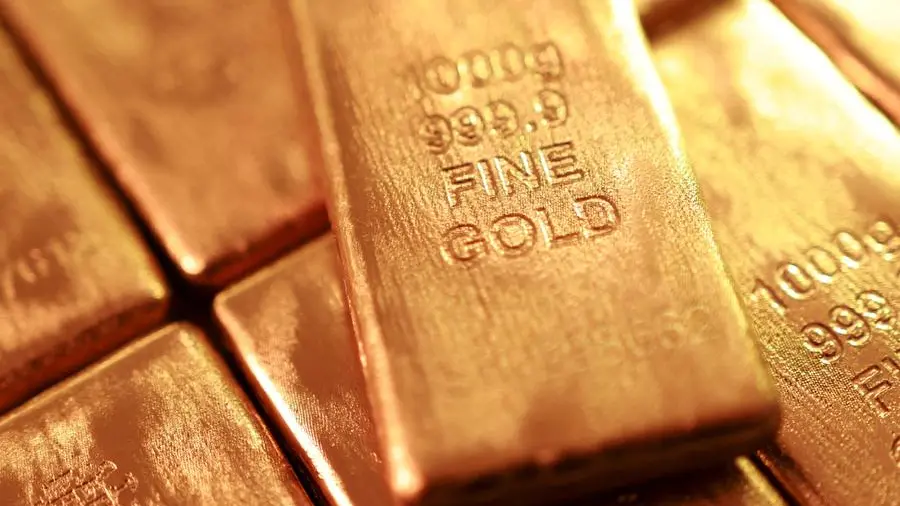 Gold slips on inflation concerns as high oil prices and stronger dollar weigh