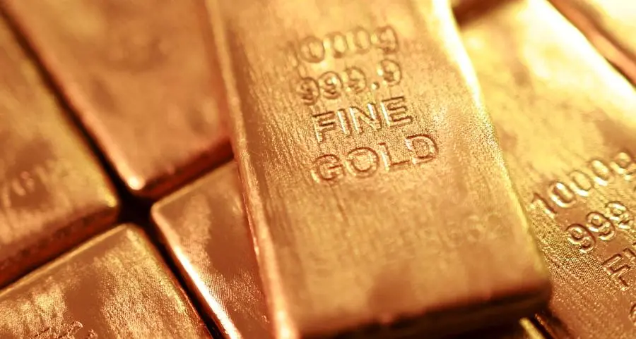 Gold climbs as Middle East peace hopes push oil and dollar lower