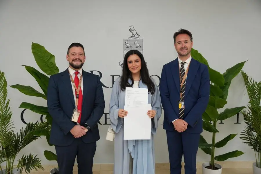 Suphia Juma Saif Alfalasi receiving her IB results. Image Courtesy: Repton School Dubai
