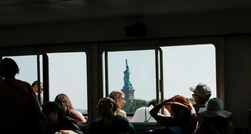 Americans slow to book summer travel amid discount hunting