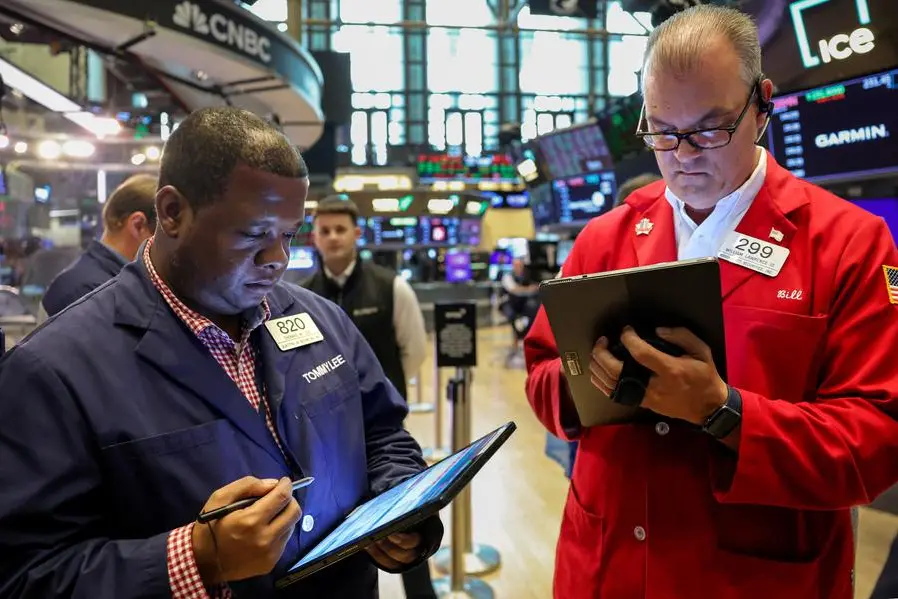 Traders work on the floor at the New York Stock Exchange (NYSE) in New York City, U.S., July 24, 2025. REUTERS/Brendan McDermid. , Reuters