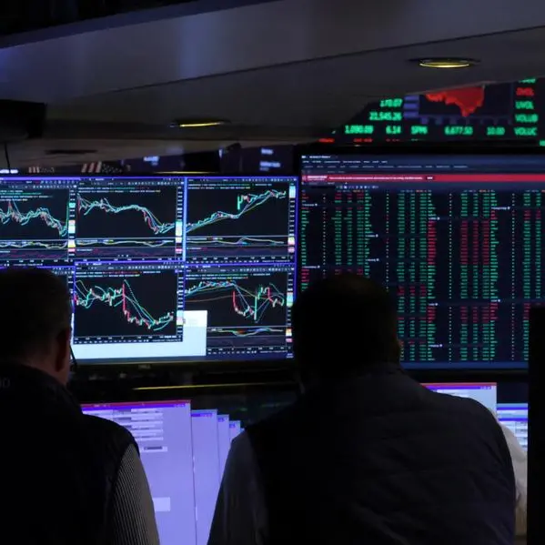 Stocks churn as traders assess Fed outlook following rate cut