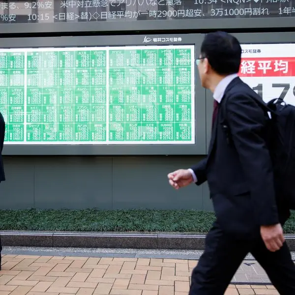 Stocks, dollar rebound in Asia as Trump steps back