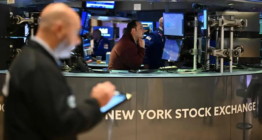 Global stocks struggle after Fed signals slower rate cuts