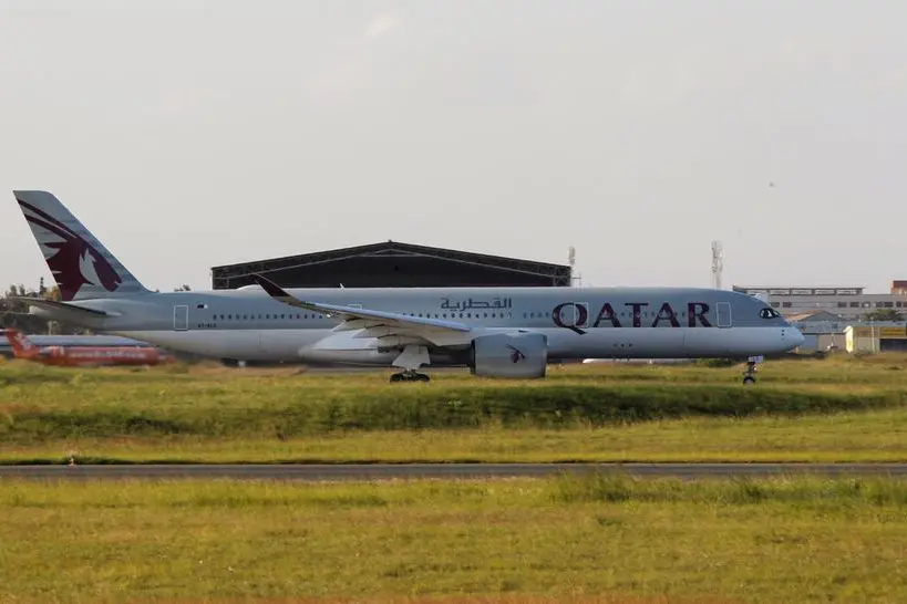 A Qatar Airways plane departs with Kenyan job seekers taking part in the government\\'s most ambitious employment initiatives ever, from the Jomo Kenyatta International Airport in Nairobi, Kenya, December 11, 2024. REUTERS/Monicah Mwangi. , Reuters