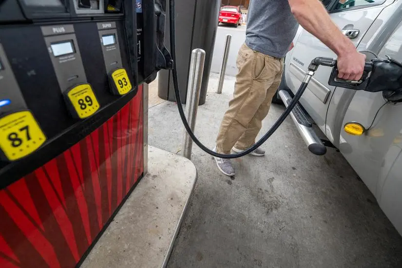 FILE PHOTO: A Sheetz customer gets gasoline at a gas station in Plains, Pennsylvania, U.S. October 19, 2022. REUTERS/Aimee Dilger/File Photo , Reuters/REUTERS