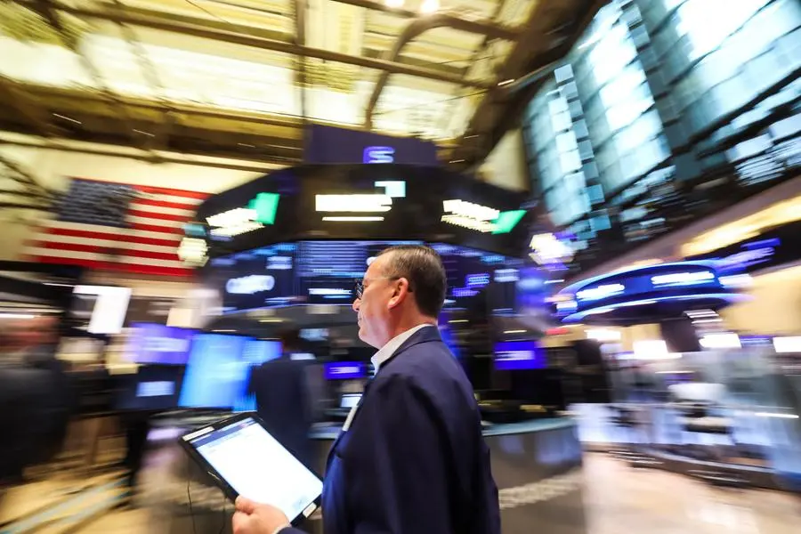 A trader works on the floor at the New York Stock Exchange (NYSE) in New York City, U.S., April 21, 2025. REUTERS/Brendan McDermid. , Reuters