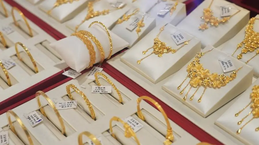 Gold climbs over 3% as Middle East peace hopes drag down dollar, oil