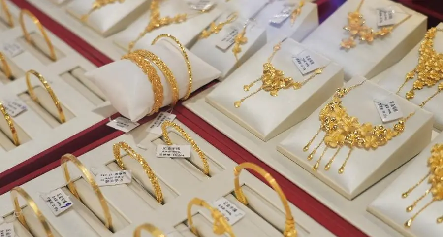 Gold climbs over 3% as Middle East peace hopes drag down dollar, oil