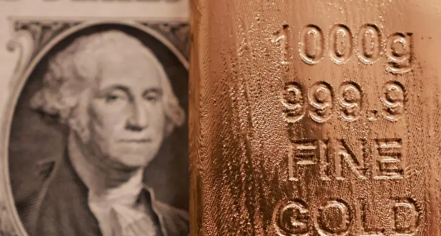 Gold jumps on weaker dollar, Middle East peace hopes