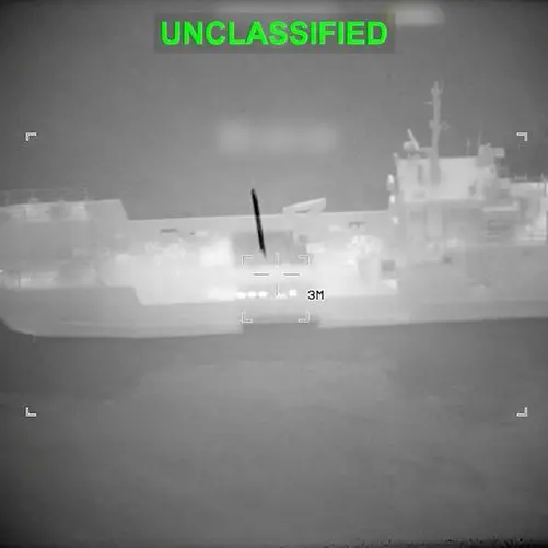 Cargo ship hit by projectile in Strait of Hormuz, crew evacuates