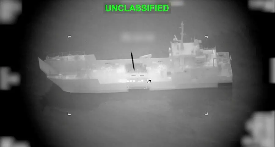 Cargo ship hit by projectile in Strait of Hormuz, crew evacuates