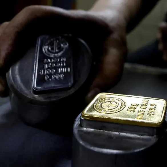 Gold slides sharply as oil surges on dimming hopes of end to Iran war