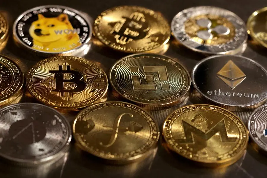 FILE PHOTO: Representations of cryptocurrencies are seen in this illustration, August 10, 2022. REUTERS/Dado Ruvic/Illustration. , Reuters