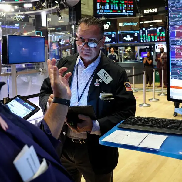 Stocks in holding pattern as traders await Powell speech