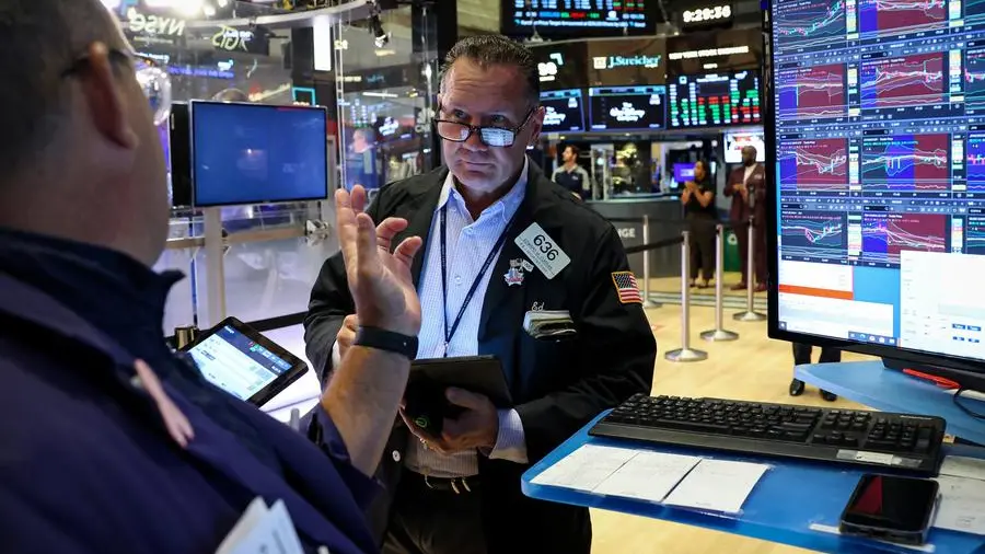 Stocks in holding pattern as traders await Powell speech