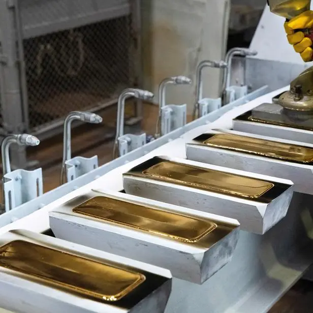 PRECIOUS-Gold extends fall to two-week low on firm dollar, Fed rate hike bets