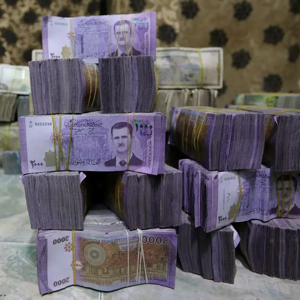 Syria to revalue currency, dropping two zeros in bid for stability, sources say