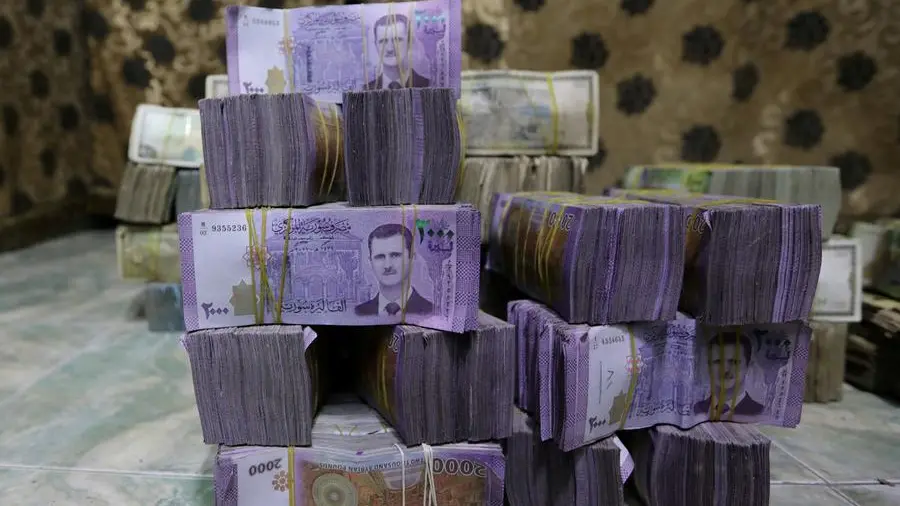 Syria to revalue currency, dropping two zeros in bid for stability, sources say
