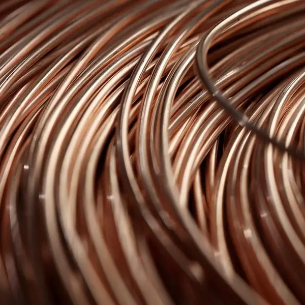 Copper buoyed by falling LME stocks
