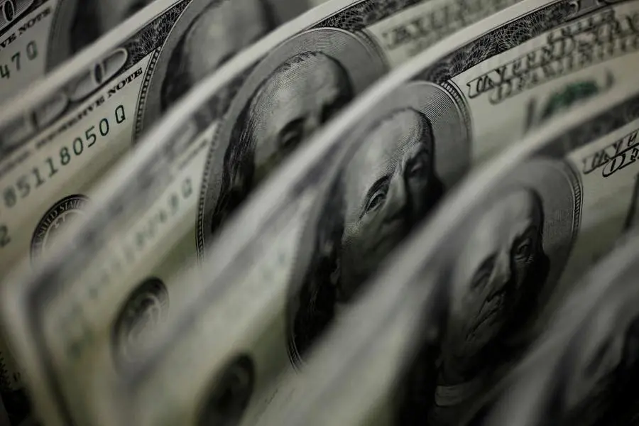 FILE PHOTO: A picture illustration shows U.S. 100 dollar bank notes taken in Tokyo August 2, 2011. REUTERS/Yuriko Nakao. , Reuters