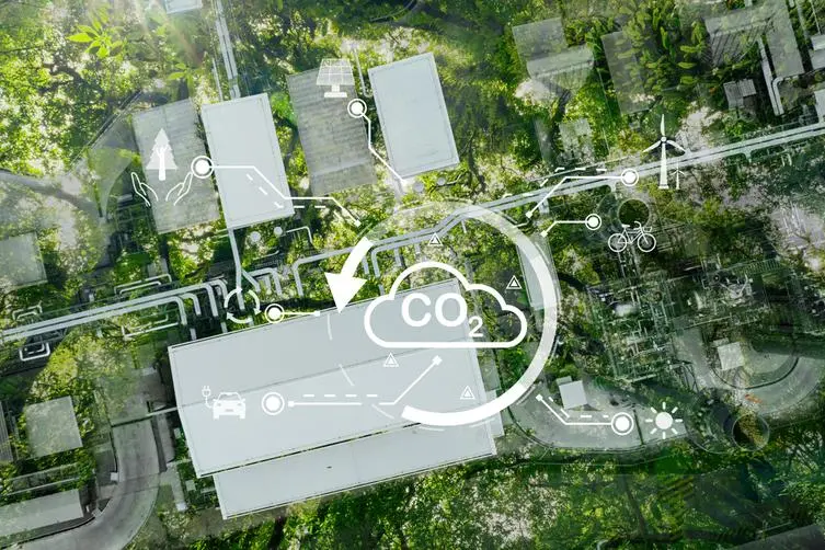 Sustainable practices for carbon reduction of factories. Renewable energy. Wind and solar power for sustainable energy. Sustainable transportation. Green energy. Carbon offsets and carbon credits. Image used for illustrative puprose. Image courtesy: Getty Images/ Fahroni , Getty Images