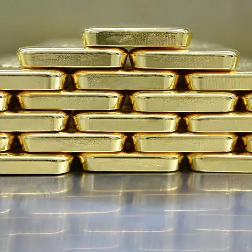 Gold inches lower from 3-week high as dollar ticks up, US reopening in focus