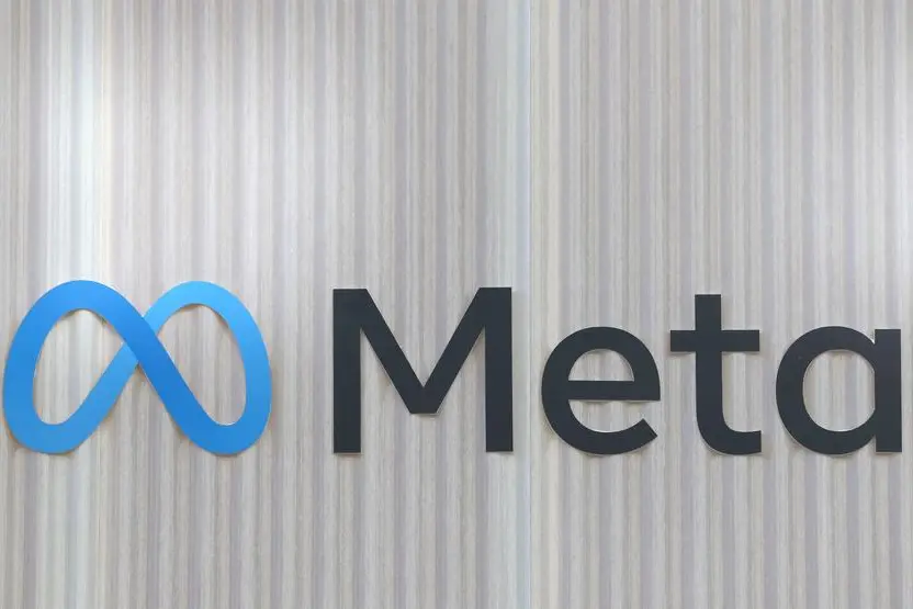 FILE PHOTO: The logo of Meta is seen at the entrance of the company\\'s temporary stand ahead of the World Economic Forum (WEF) in Davos, Switzerland January 18, 2025. REUTERS/Yves Herman. , Reuters