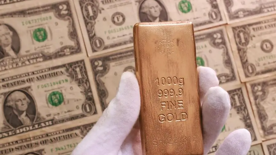 Gold rises 1% on easing inflation worries, dollar at one-week low