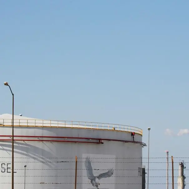 Oil prices fall on expected weaker demand, but set for weekly gain