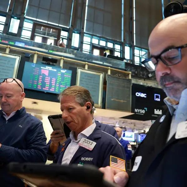 Stocks slide on flare-up in Middle East fighting; oil eases off highs