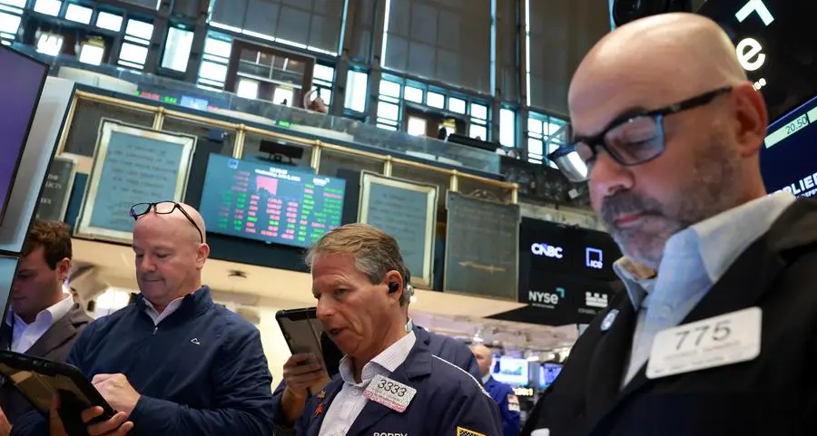 Stocks slide on flare-up in Middle East fighting; oil eases off highs