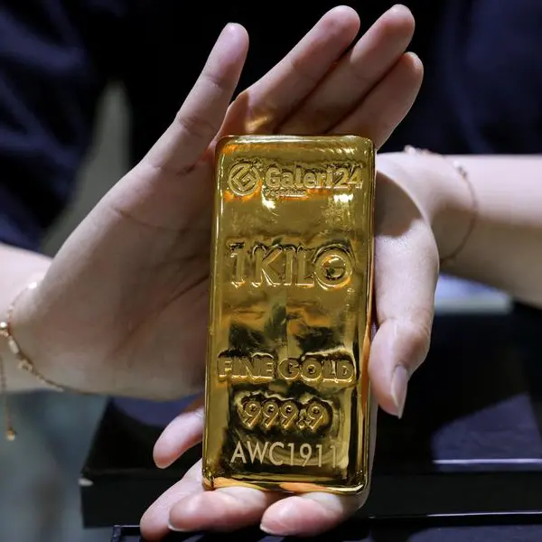 Gold rises on Fed rate cut expectations, weaker dollar