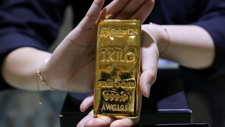Gold extends record run while silver joins rally to new high
