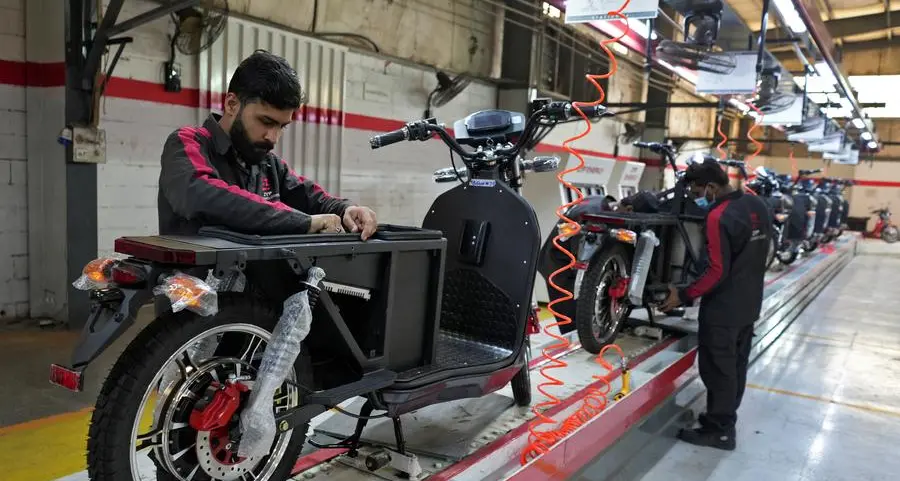 Soaring costs, fuel shortage fears drive Pakistan to electric motorbikes