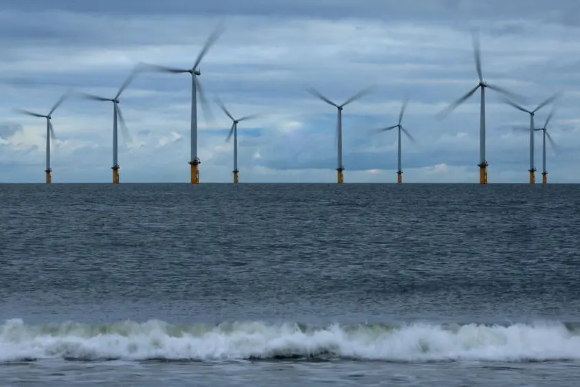 FILE PHOTO: Waves break in front of the Teesside Wind Farm in Redcar, Britain, November 7, 2023. REUTERS/Phil Noble. , Reuters