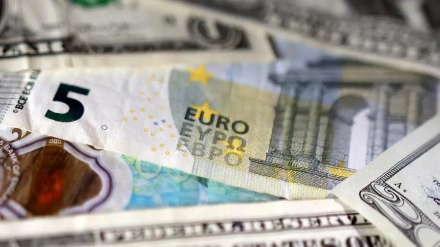 Dollar drops with US yields after data, set for fourth weekly rise vs euro