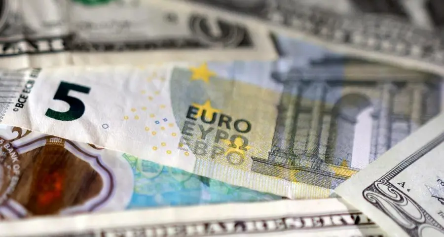 Dollar drops with US yields after data, set for fourth weekly rise vs euro