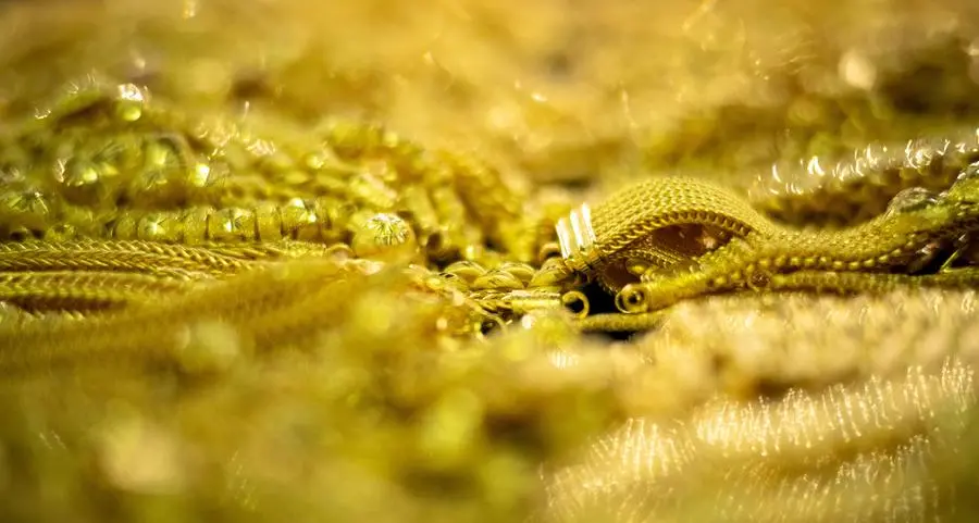 Gold hits record high as investors turn to safe haven