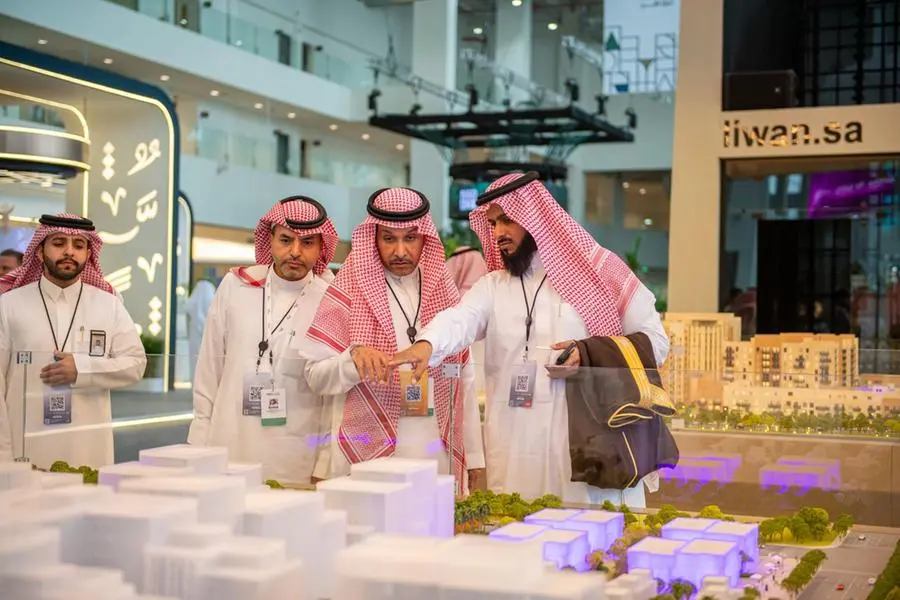 Abdulrahman bin Saud Aldhyem, Founder and CEO of Liwan Real Estate Development Company (4th from left) with company executives at Cityscape Global Riyadh.