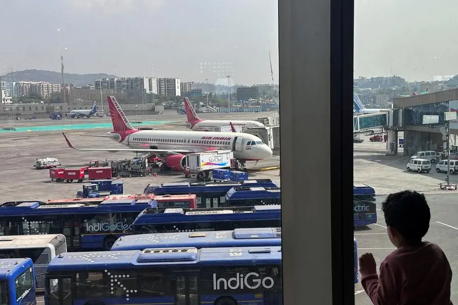 FILE PHOTO: A boy looks at Air India airline passenger aircrafts parked at the Chhatrapati Shivaji Maharaj International Airport in Mumbai, India, February 1, 2024. REUTERS/Francis Mascarenhas//File Photo , Reuters/REUTERS