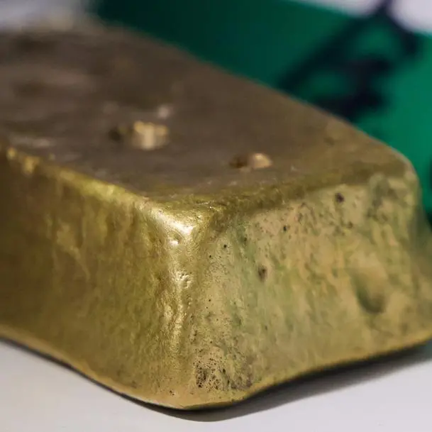 Gold slips as upbeat US data boosts dollar, dims rate-cut bets