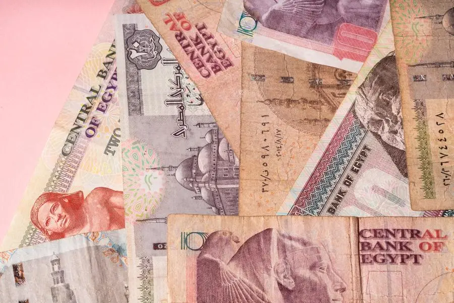 CAIRO, EGYPT - October 12: Portraits of Egyptian Pound notes and coins on October 12, 2016 in Cairo, Egypt. The Egyptian Pound is the currency of Egypt controlled by the Central Bank of Egypt. (Photo by David Degner/Getty Images). Image used for illustrative purpose. Getty Images , Getty Images