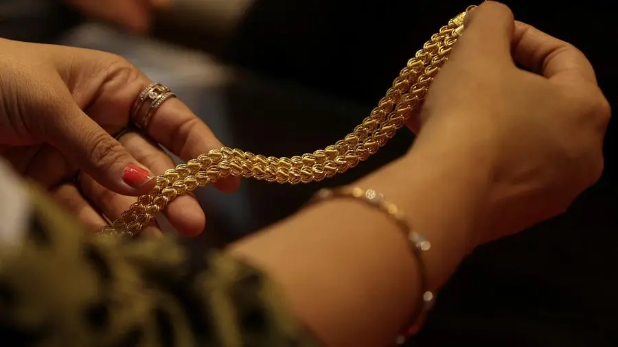 Gold rebounds from six-month low but rate-hike fears cap gains